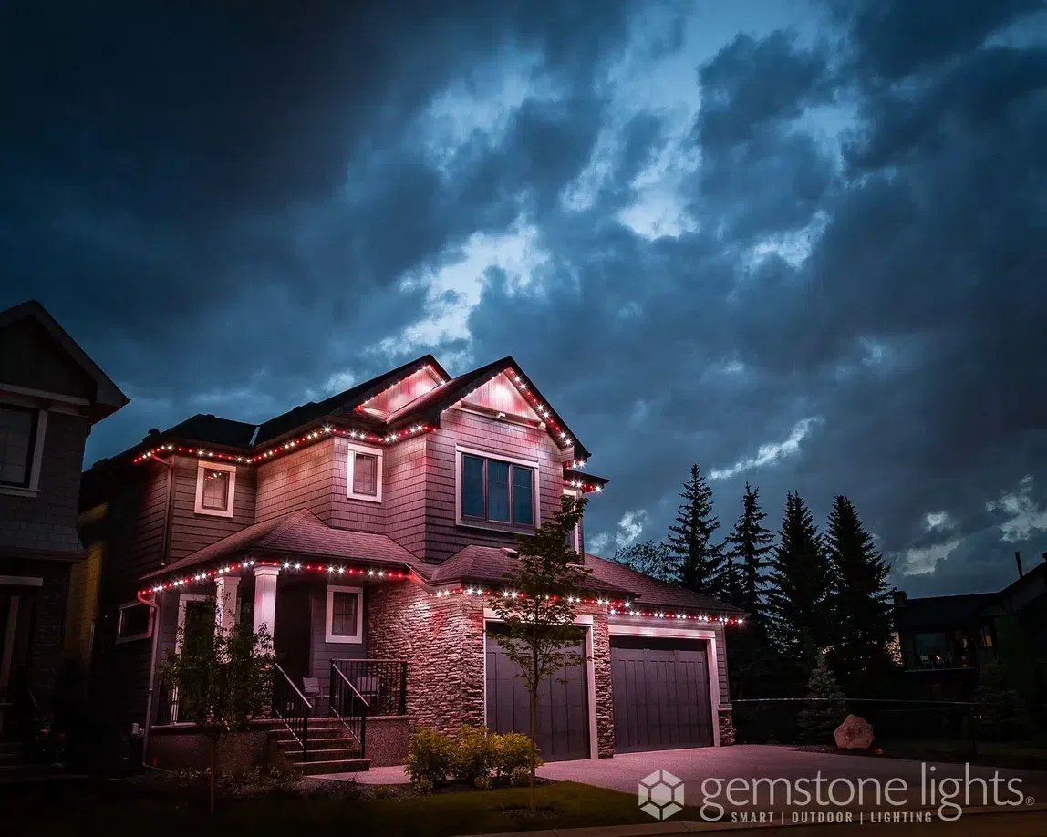House lit in alternating red and white
